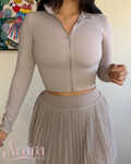 Chaqueta deportiva con cierre.